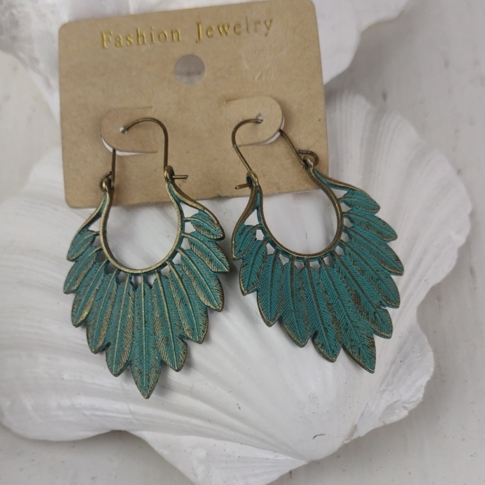 Green Patina Leaf Earrings with Radiant Design